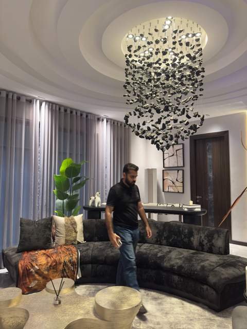 Living room with statement stone-cluster chandelier