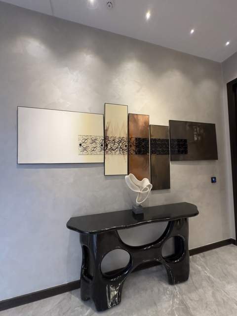 Entryway console with layered abstract panels